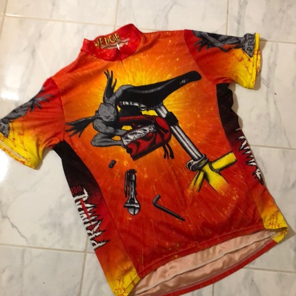 Primal wear biking shirt. Zip front. Back pockets.
